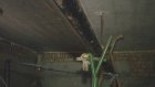 Вода из ливневой канализации размывает подвал дома на Собинова