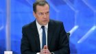Медведев подписал распоряжение о доплате к пенсиям