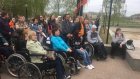 В Пензе инвалиды-колясочники пронесли Знамя Победы