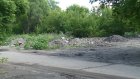 На улице Рылеева с мая не могут убрать горы строительного мусора