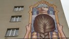В Пензе художник изобразил связь времен на фасаде здания колледжа
