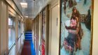 Вагон поезда «Сура» украсили картинами Федота Сычкова
