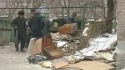 Мусорная площадка на Дзержинского привлекает бомжей со всей области