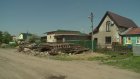 Жительница Романовки закрыла проезд строительными материалами