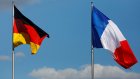 Франция и Германия отказались наказывать Россию санкциями