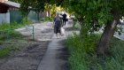 На ул. Гоголя расширят тротуар и защитят газон от размывания