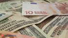Вероятность роста курса доллара до 100 рублей оценили