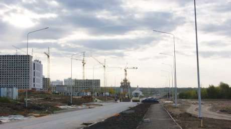 На дороге севернее «Лугометрии» уложили слой асфальта