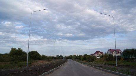 На дороге севернее «Лугометрии» уложили слой асфальта