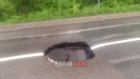 На ул. Металлистов провалился кусок асфальта со свежей разметкой